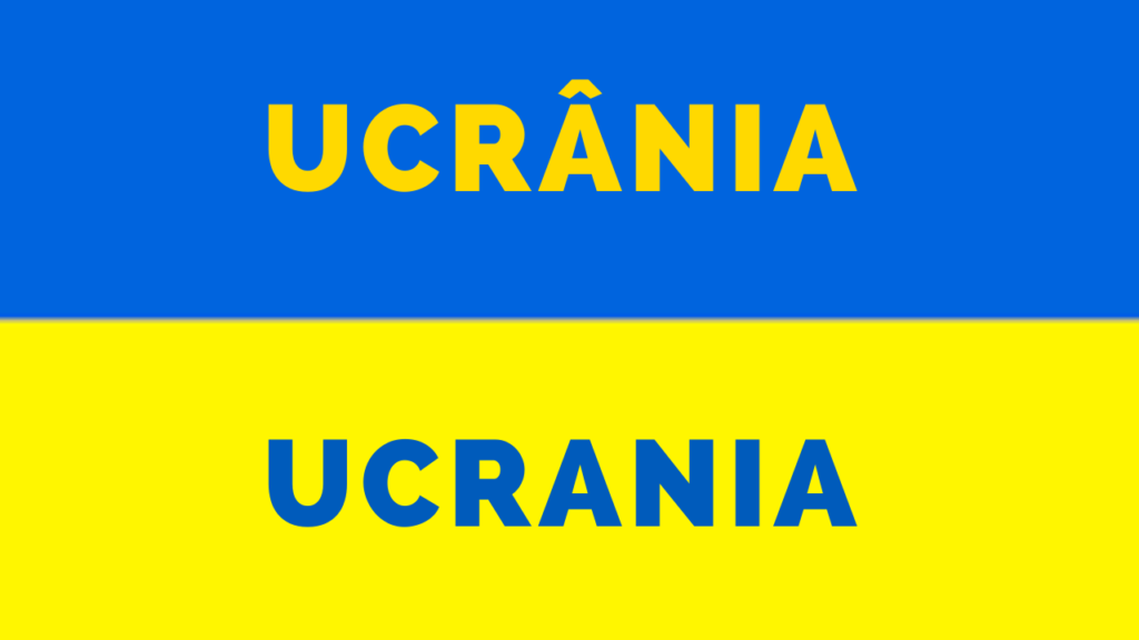 A imagem mostra uma bandeira azul e amarela, onde está escrito: "Ucrânia ou Ucrania?".