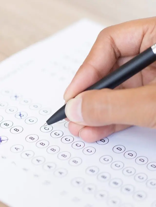 Closeup of Person Filling out Questionary Form